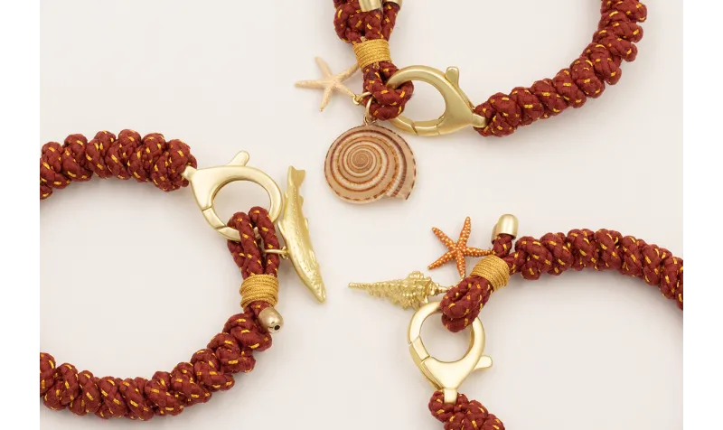 Pulsera de cordón marrón hilo dorado con nudo serp