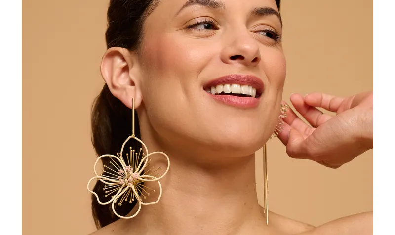 Pendientes asimetricos sol destelleante con ramas 