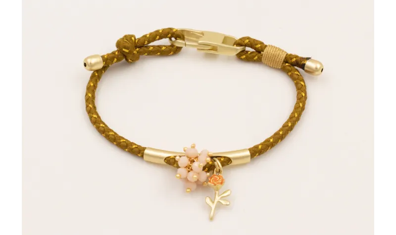 Pulsera cordón pistacho con hilo dorado, tubo meta