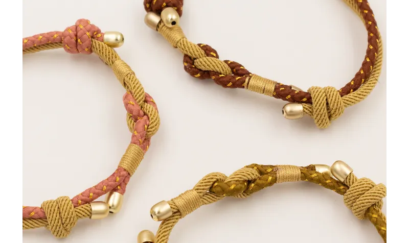 Pulsera cordón retorcido trenzado beige y cordón m