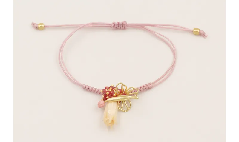 Pulsera hilo macramé lila con nudo serpiente centr
