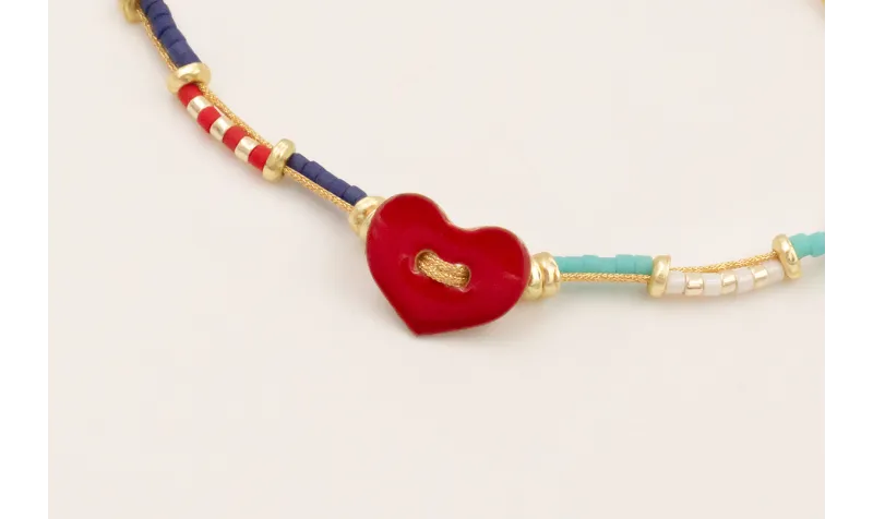 Pulsera hilo metalico dorado con corazón 2 agujero