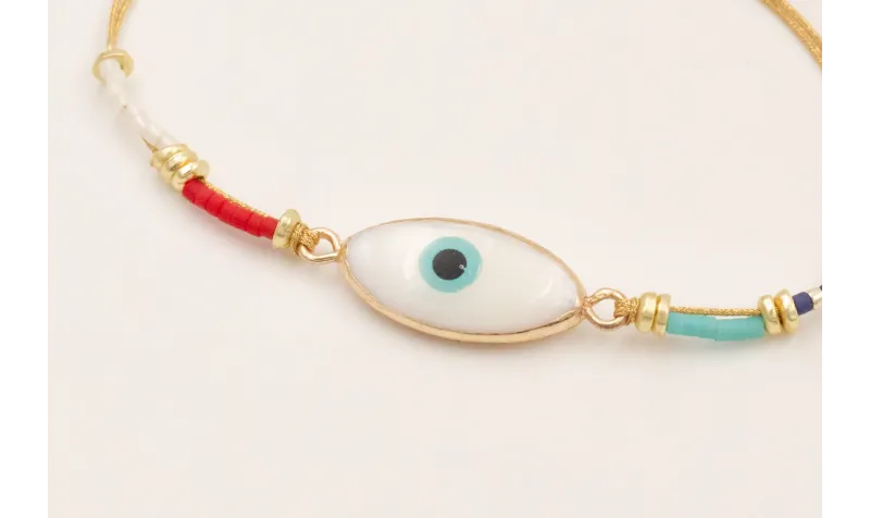 Pulsera hilo metalico dorado con ojo turco nacar b