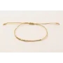 Pulsera hilo macramé dorado con mini facetas dorad
