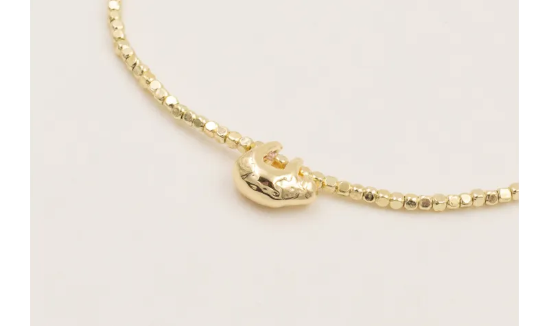 Pulsera hilo macramé lila koala dorado y facetadas