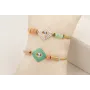 Pulsera de acero inoxidable con hilo dorado nudo s
