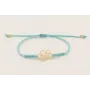 Pulsera hilo azul claro con pieza 6 aros dorada ma