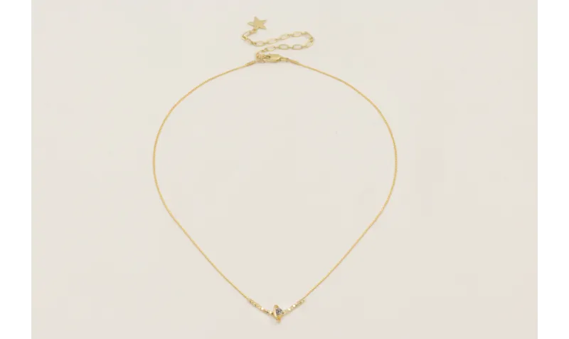 Collar cadena fina dorado con planeta brillos y mi