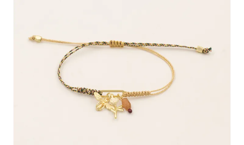 Pulsera de hilo por mitades dorado, verde,morado c