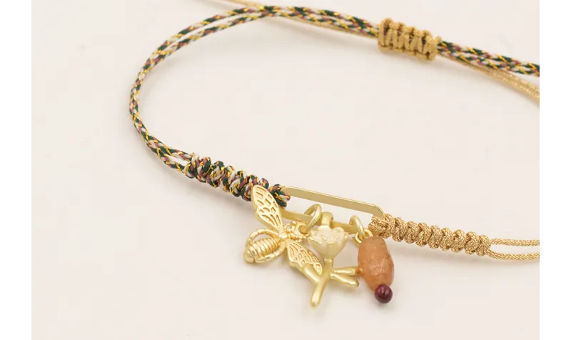 Pulsera de hilo por mitades dorado, verde,morado c