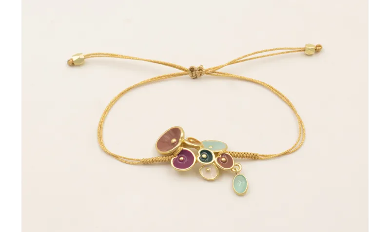 Pulsera hilo dorado con nudo serpiente y centro fl