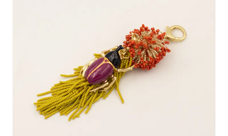 Llavero bola de abalorio cristal y naranja con fle