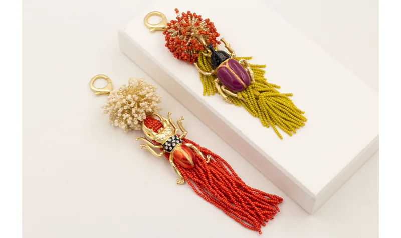 Llavero bola de abalorio cristal y naranja con fle