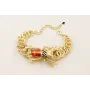 Pulsera aros entrelazados dorado mate con escaraba