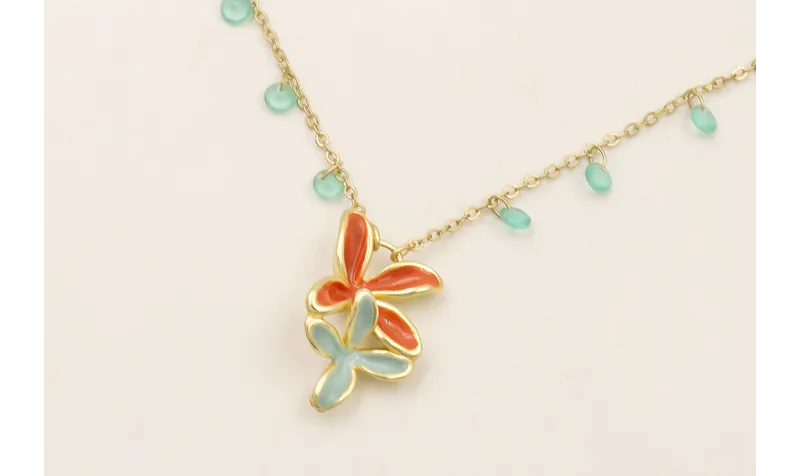 Collar cadena cristales turquesas con colgante flo