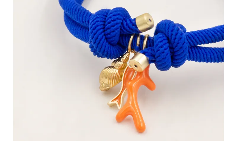 Pulsera cordón elastico azulón con nudos corredizo