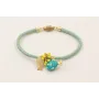 Pulsera cordón aqua con hilo dorado cierre de iman
