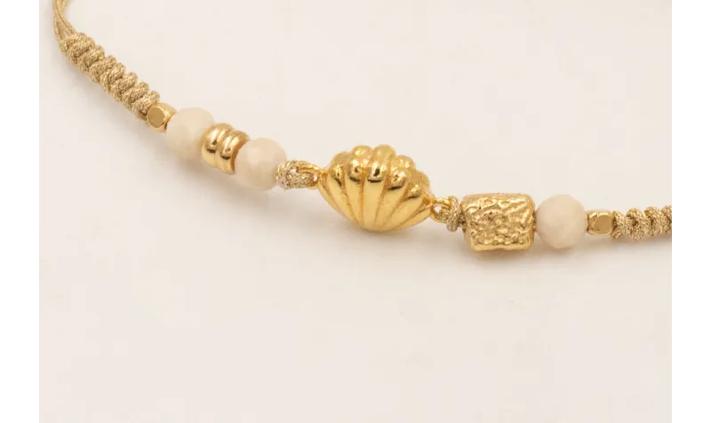 Pulsera ORO18K nudo serpiente hilo metalico dorada