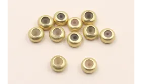 Disco 6mm Oro diam con silicona, agujero de 1mm  / Cuentas Metálicas de Latón / Zamak
